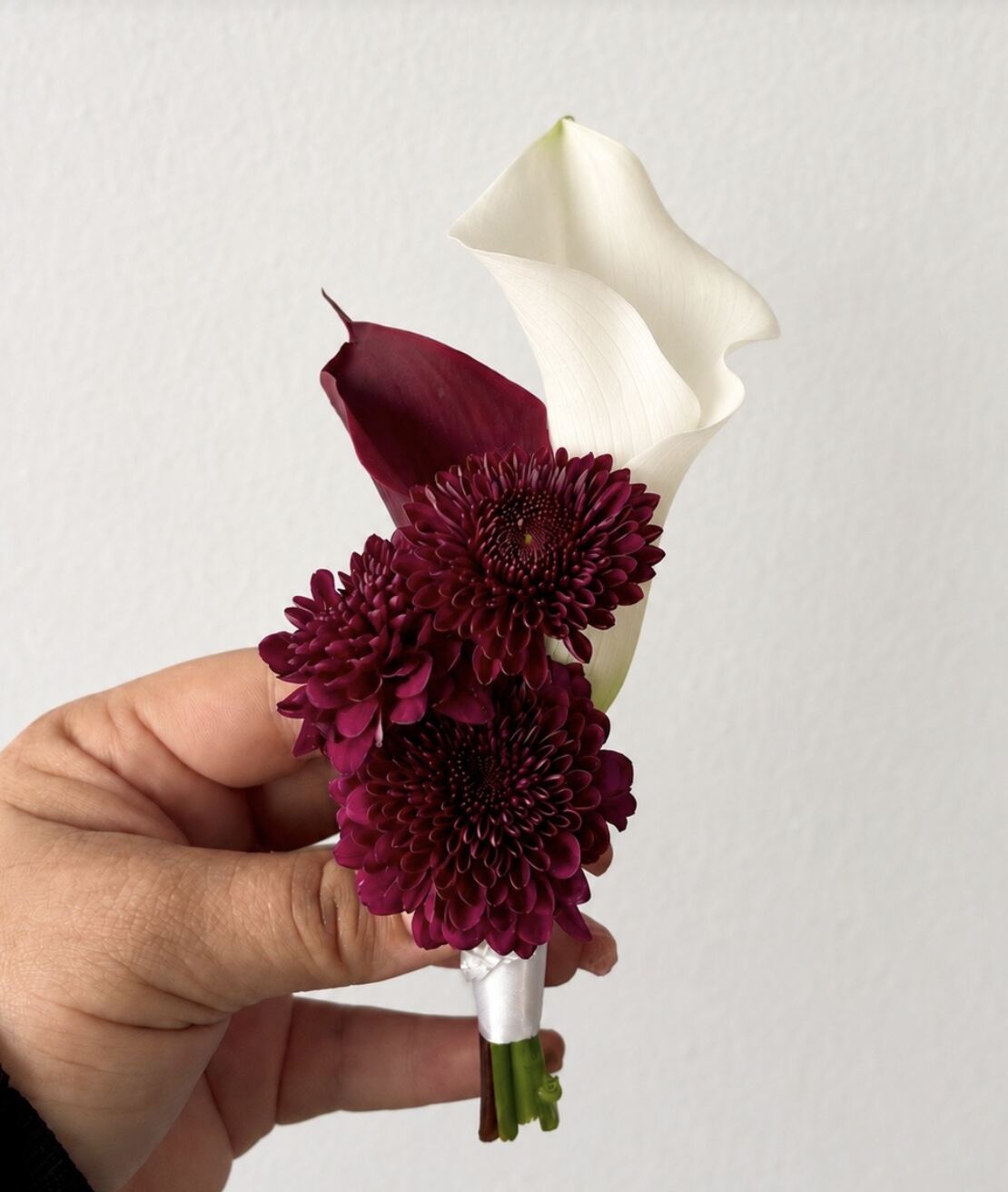 Candela Flower Co. burgundy and white arrangement in vase