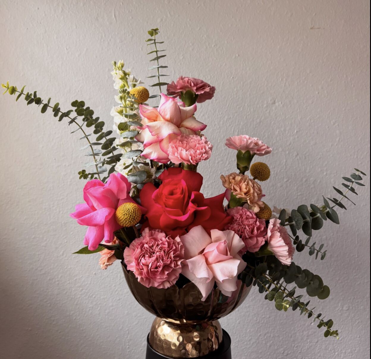 Candela Flower Co. arrangement in a gold bowl