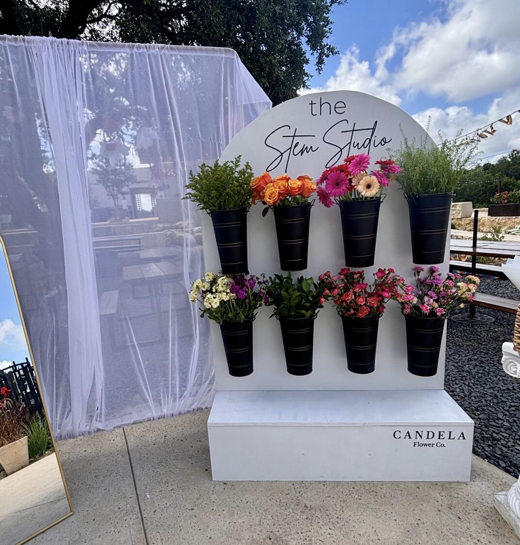 Candela Flower Co. Stem Studio flower wall setup