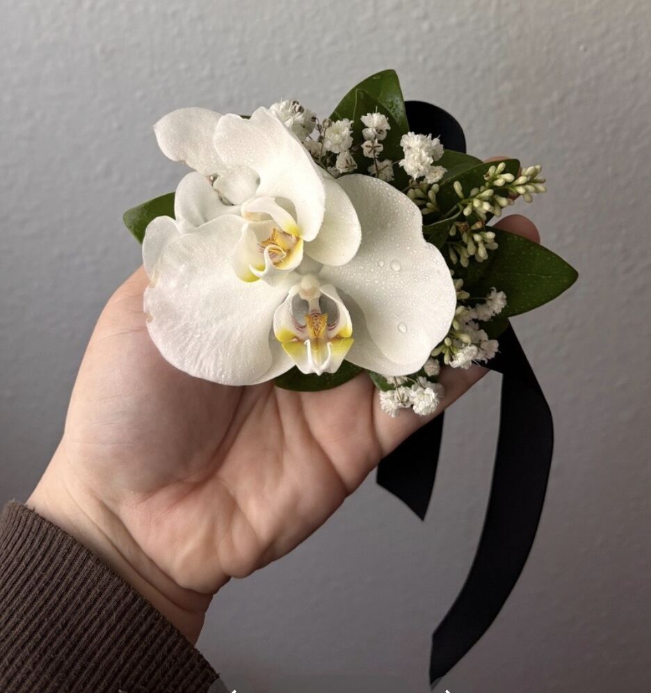 Candela Flower Co. white orchid corsage