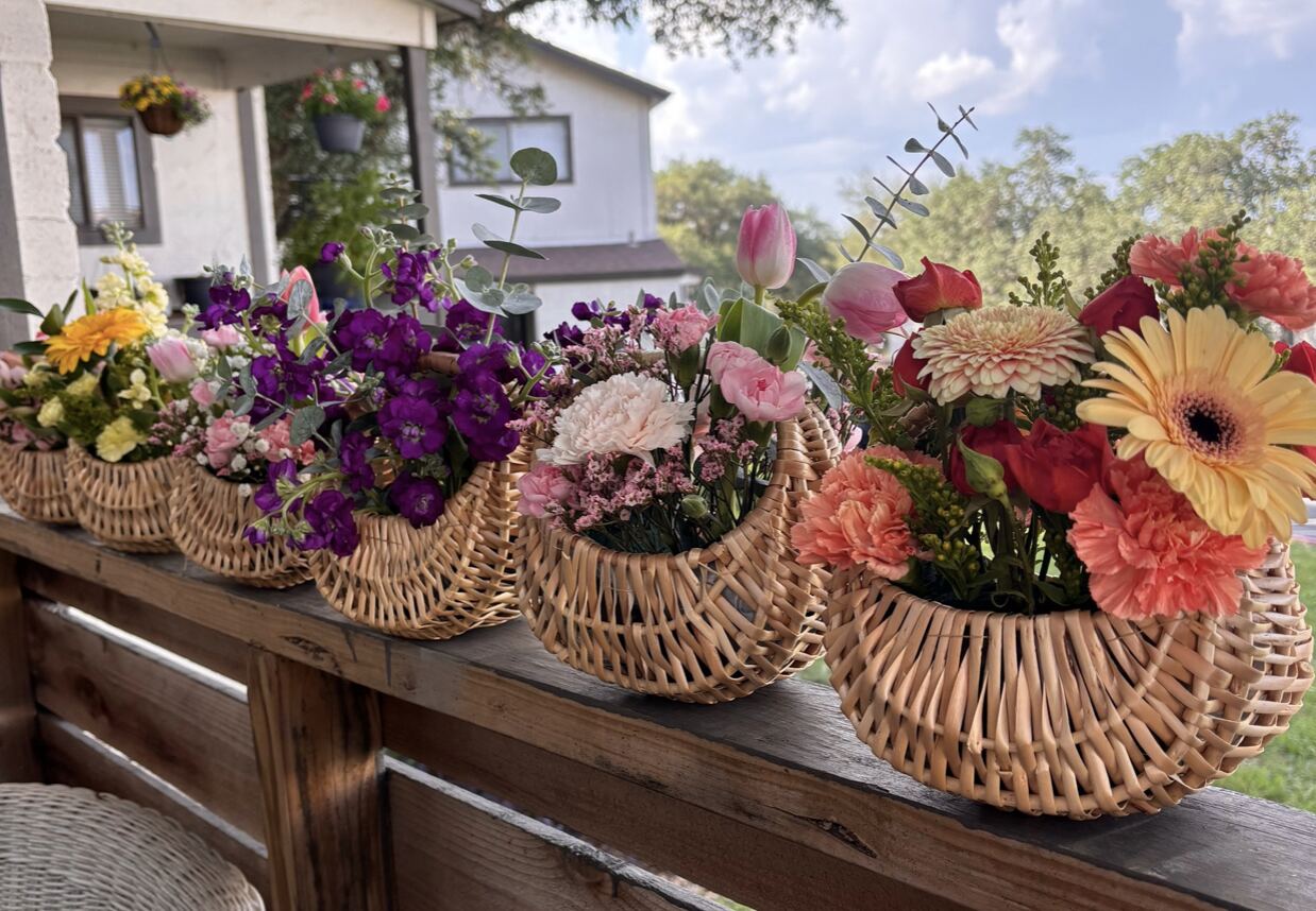 Candela Flower Co. row of basket arrangements